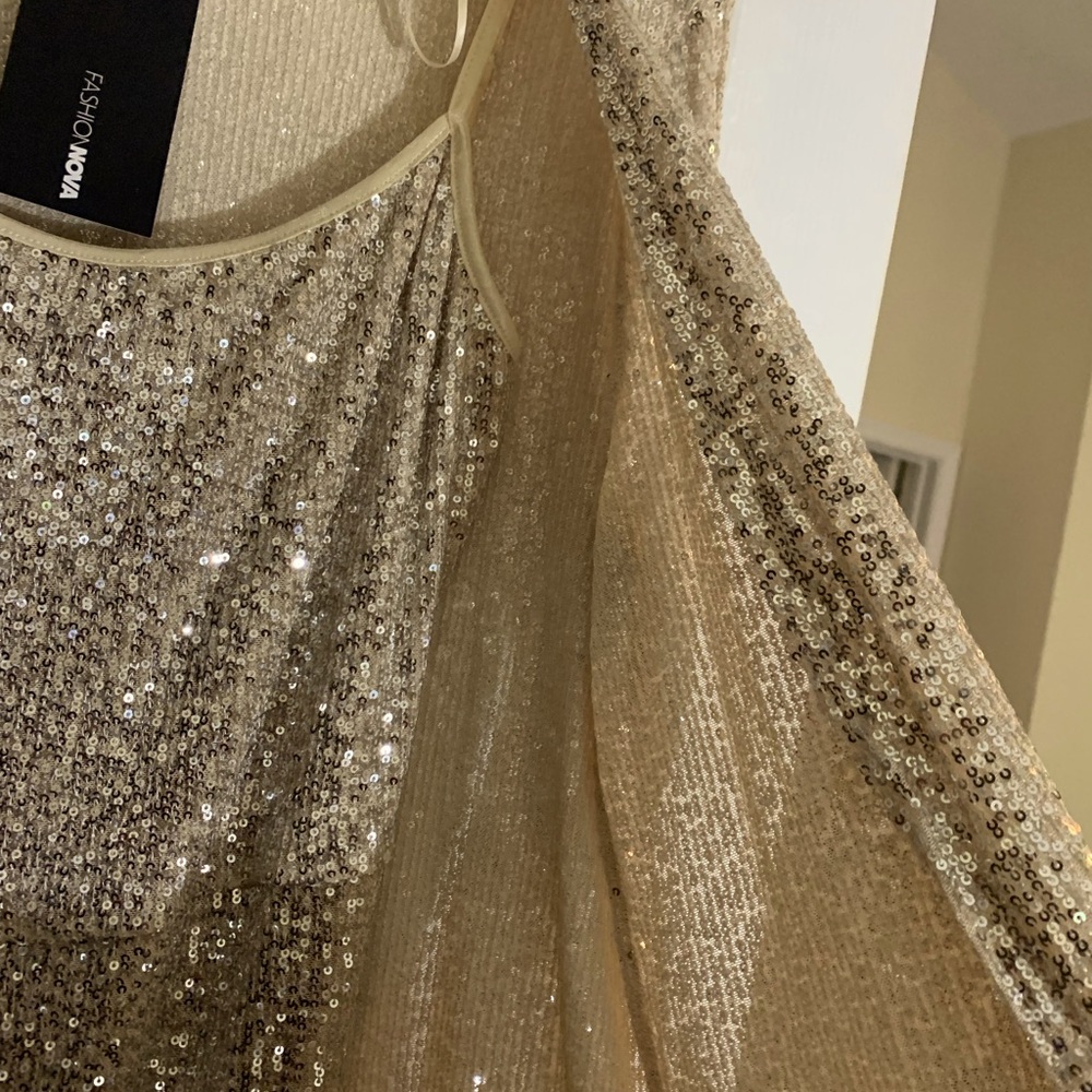 Fashion, nova two-piece gold sequin cat suit with duster. Never worn.